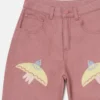 Jeans in denim con ricamo colomba Jeans in denim con ricamo colomba