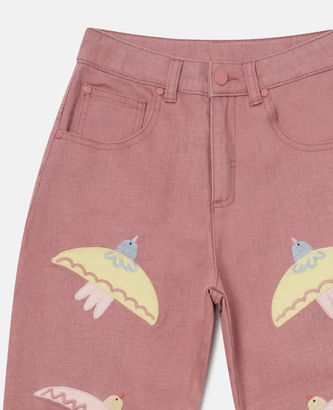 Jeans in denim con ricamo colomba Jeans in denim con ricamo colomba