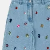 Jeans in denim con ricamo gioiello Jeans in denim con ricamo gioiello