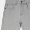 Jeans in denim con stampa grafica scoiattolo Jeans in denim con stampa grafica scoiattolo
