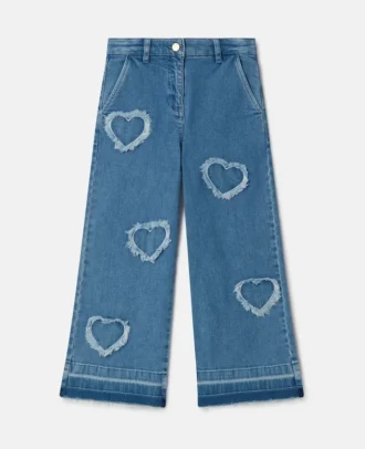 Jeans in denim elasticizzato con toppa a forma di cuore con frange Jeans in denim elasticizzato con toppa a forma di cuore con frange