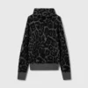 Maglione a collo alto in jacquard leopardato Maglione a collo alto in jacquard leopardato