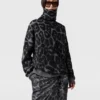 Maglione a collo alto in jacquard leopardato Maglione a collo alto in jacquard leopardato