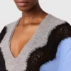 Maglione a maniche lunghe con inserti in pizzo Maglione a maniche lunghe con inserti in pizzo