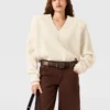 Maglione a maniche lunghe con scollo a V Maglione a maniche lunghe con scollo a V
