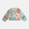 Maglione con maniche a palloncino e logo ricamato Maglione con maniche a palloncino e logo ricamato