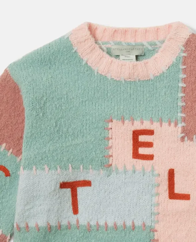 Maglione con maniche a palloncino e logo ricamato Maglione con maniche a palloncino e logo ricamato