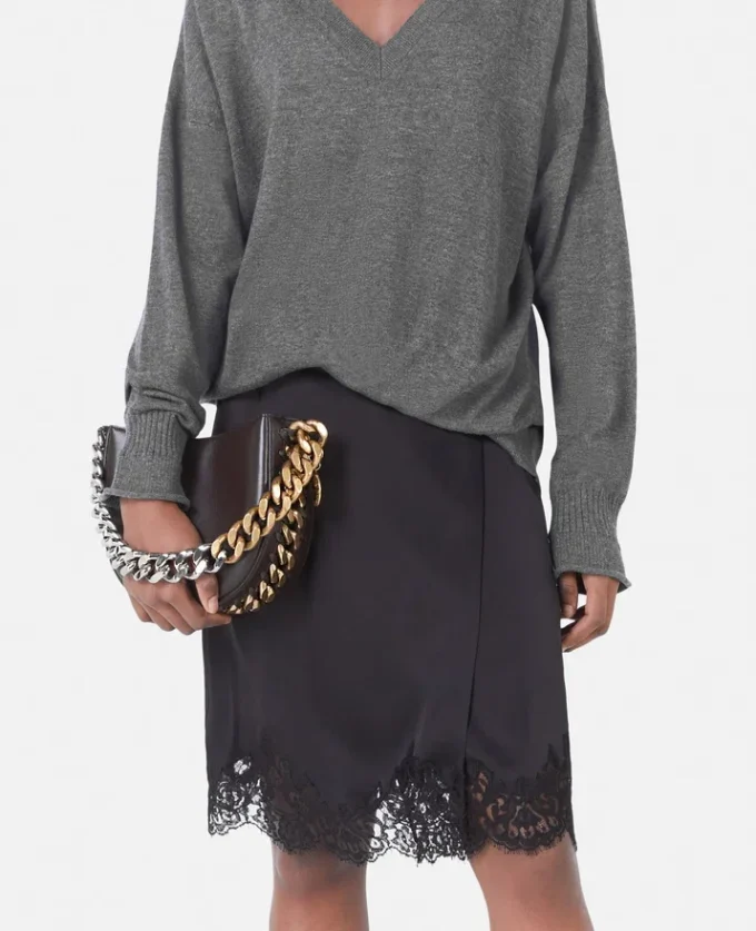 Maglione con scollo a V e maniche lunghe Maglione con scollo a V e maniche lunghe