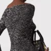 Maglione con spalle scoperte e paillettes Maglione con spalle scoperte e paillettes