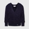 Maglione Falabella con scollo a V lavorato a trecce Maglione Falabella con scollo a V lavorato a trecce