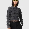 Maglione Falabella lavorato a trecce Maglione Falabella lavorato a trecce