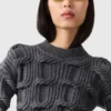 Maglione Falabella lavorato a trecce Maglione Falabella lavorato a trecce