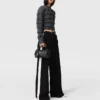 Maglione Falabella lavorato a trecce Maglione Falabella lavorato a trecce