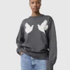 Maglione girocollo con applicazioni colomba Maglione girocollo con applicazioni colomba