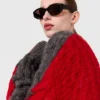 Maglione girocollo con maniche allacciate e lavorazione a trecce Maglione girocollo con maniche allacciate e lavorazione a trecce