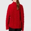 Maglione girocollo con maniche allacciate e lavorazione a trecce Maglione girocollo con maniche allacciate e lavorazione a trecce
