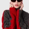Maglione girocollo con maniche allacciate e lavorazione a trecce Maglione girocollo con maniche allacciate e lavorazione a trecce