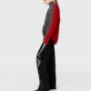 Maglione girocollo con maniche allacciate e lavorazione a trecce Maglione girocollo con maniche allacciate e lavorazione a trecce