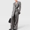 Pantaloni dritti a pieghe gessati Pantaloni dritti a pieghe gessati