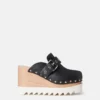 Mules Elyse con borchie a stella Mules Elyse con borchie a stella