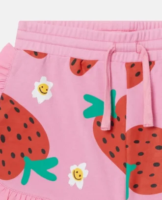 Pantaloncini con stampa a fragole e frange