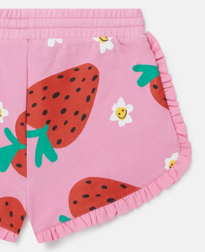 Pantaloncini con stampa a fragole e frange Pantaloncini con stampa a fragole e frange