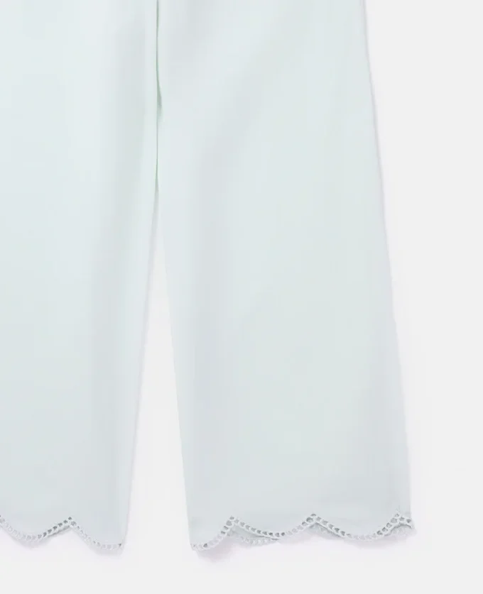 Pantaloni a gamba larga con bordo smerlato Pantaloni a gamba larga con bordo smerlato