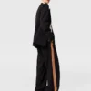Pantaloni a gamba larga con piega Pantaloni a gamba larga con piega