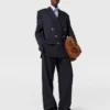 Pantaloni a gamba larga con piega Pantaloni a gamba larga con piega