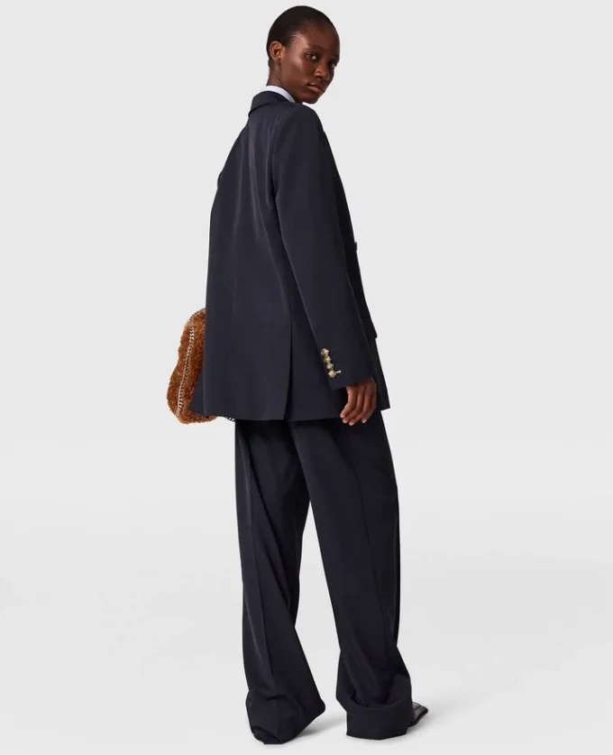 Pantaloni a gamba larga con piega Pantaloni a gamba larga con piega