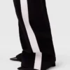 Pantaloni a vita bassa a righe e gamba dritta Pantaloni a vita bassa a righe e gamba dritta