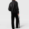 Pantaloni a vita bassa a righe e gamba dritta Pantaloni a vita bassa a righe e gamba dritta