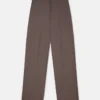 Pantaloni a vita bassa con pieghe Pantaloni a vita bassa con pieghe