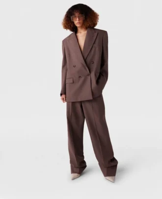 Pantaloni a vita bassa con pieghe
