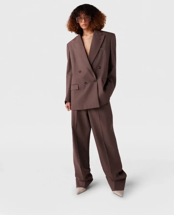 Pantaloni a vita bassa con pieghe Pantaloni a vita bassa con pieghe