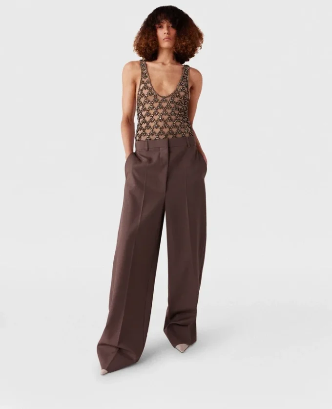 Pantaloni a vita bassa con pieghe Pantaloni a vita bassa con pieghe