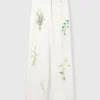 Pantaloni a vita bassa con stampa floreale e gamba dritta Pantaloni a vita bassa con stampa floreale e gamba dritta