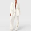 Pantaloni a vita bassa con stampa floreale e gamba dritta Pantaloni a vita bassa con stampa floreale e gamba dritta
