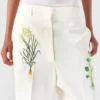 Pantaloni a vita bassa con stampa floreale e gamba dritta Pantaloni a vita bassa con stampa floreale e gamba dritta