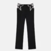 Pantaloni a vita ultra bassa con stelle di strass Pantaloni a vita ultra bassa con stelle di strass