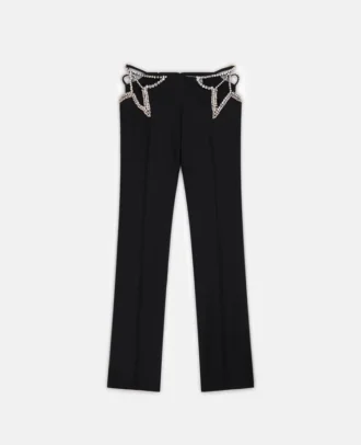Pantaloni a vita ultra bassa con stelle di strass