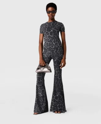 Pantaloni a zampa di media altezza con stampa leopardata