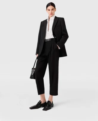 Pantaloni in lana a vita alta con pieghe Pantaloni in lana a vita alta con pieghe