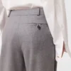 Pantaloni in lana a vita alta con pieghe Pantaloni in lana a vita alta con pieghe
