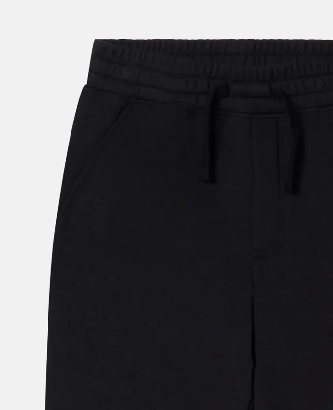 Pantaloni jogging con toppe sui ginocchi Pantaloni jogging con toppe sui ginocchi