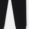 Pantaloni jogging con toppe sui ginocchi Pantaloni jogging con toppe sui ginocchi
