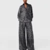 Pantaloni oversize con coulisse e stampa leopardata Pantaloni oversize con coulisse e stampa leopardata