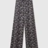 Pantaloni oversize con coulisse e stampa pizzo Pantaloni oversize con coulisse e stampa pizzo