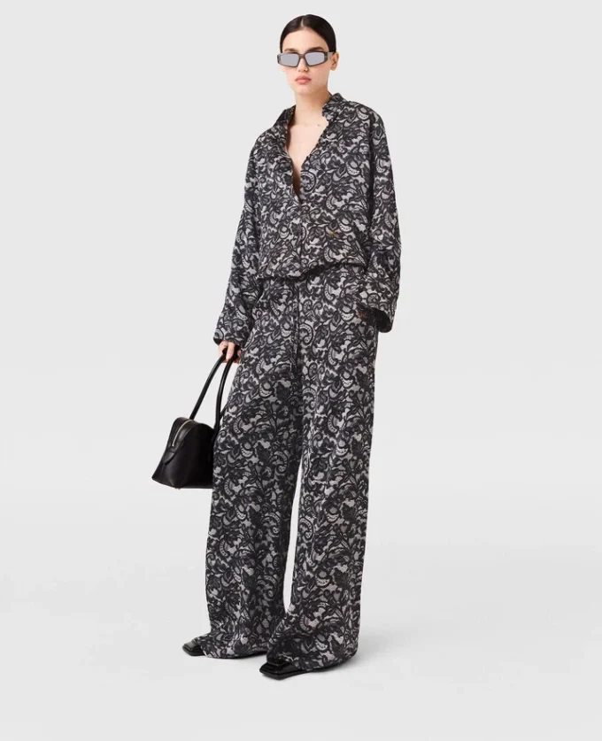 Pantaloni oversize con coulisse e stampa pizzo Pantaloni oversize con coulisse e stampa pizzo