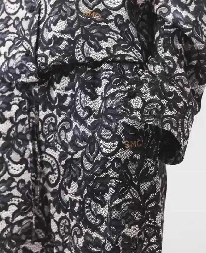 Pantaloni oversize con coulisse e stampa pizzo Pantaloni oversize con coulisse e stampa pizzo